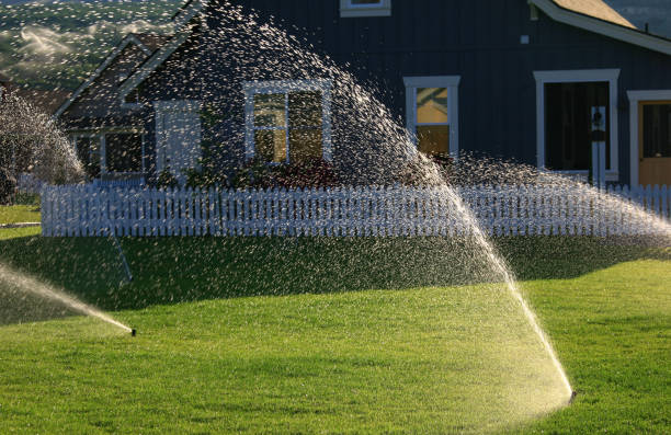 Automatic lawn sprinkler installation in suburban property by Miles Creek Irrigation