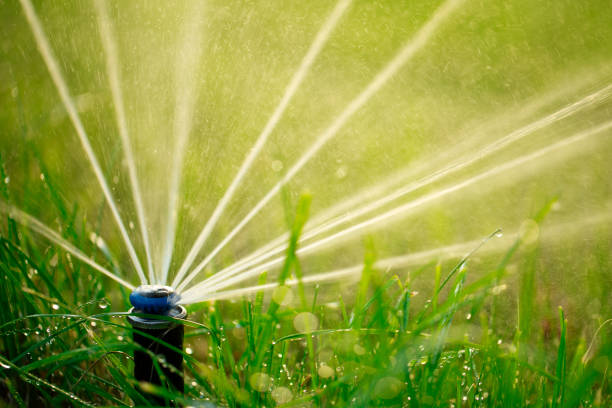 Lawn sprinkler system repair service restoring water flow