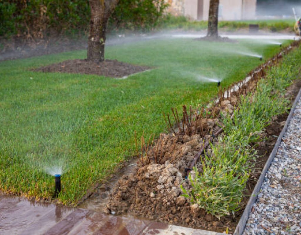 Automatic lawn sprinkler installation in suburban property by Miles Creek Irrigation