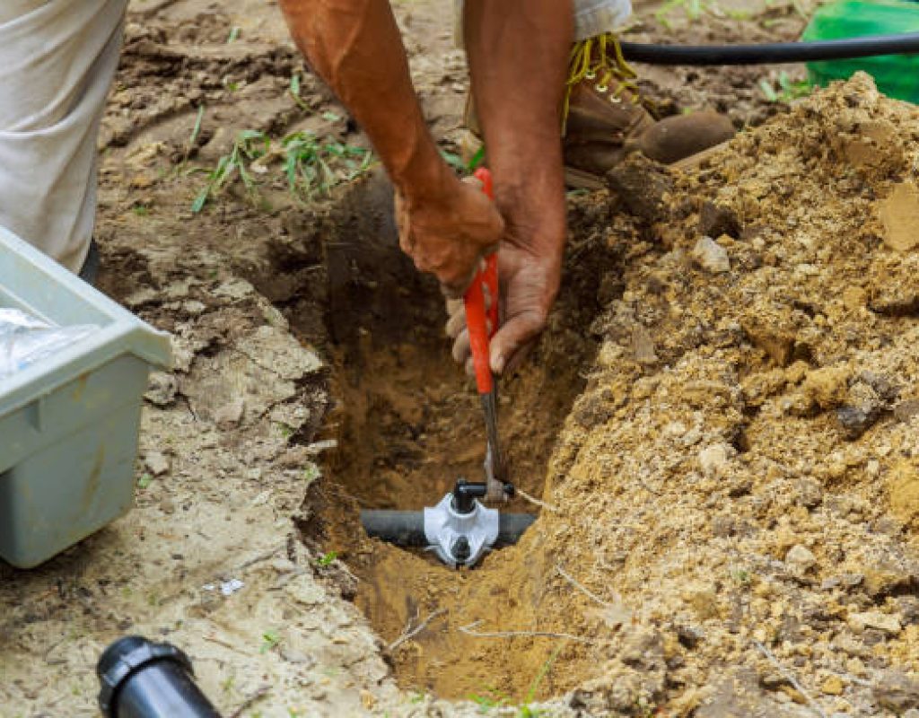 Lawn irrigation repair service improving sprinkler water distribution