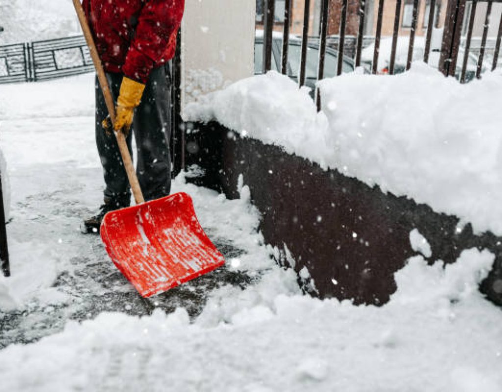 winter snow removal team using equipment to clear heavy accumulation promptly