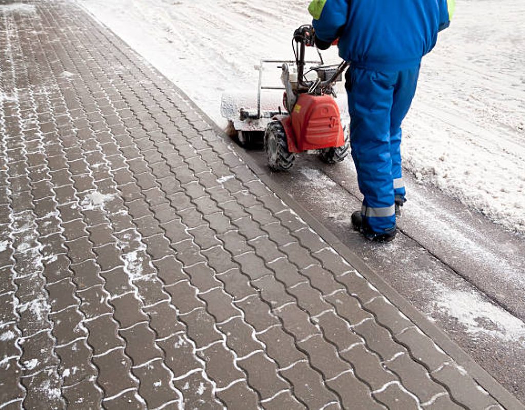 Efficient driveway snow removal Miles Creek Irrigation and Lighting professionals