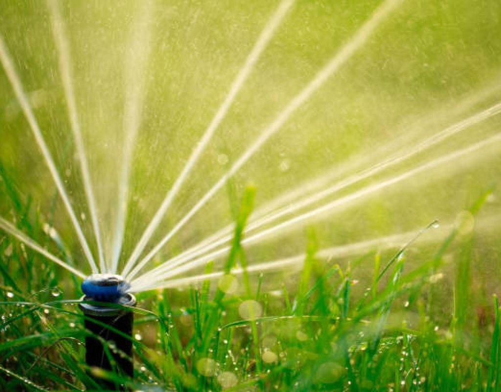 Lawn sprinkler system repair service restoring water flow