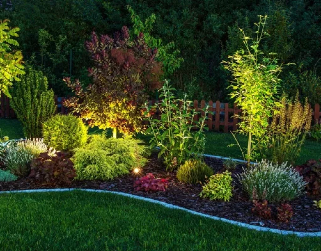 Miles Creek team installing garden pathway lighting